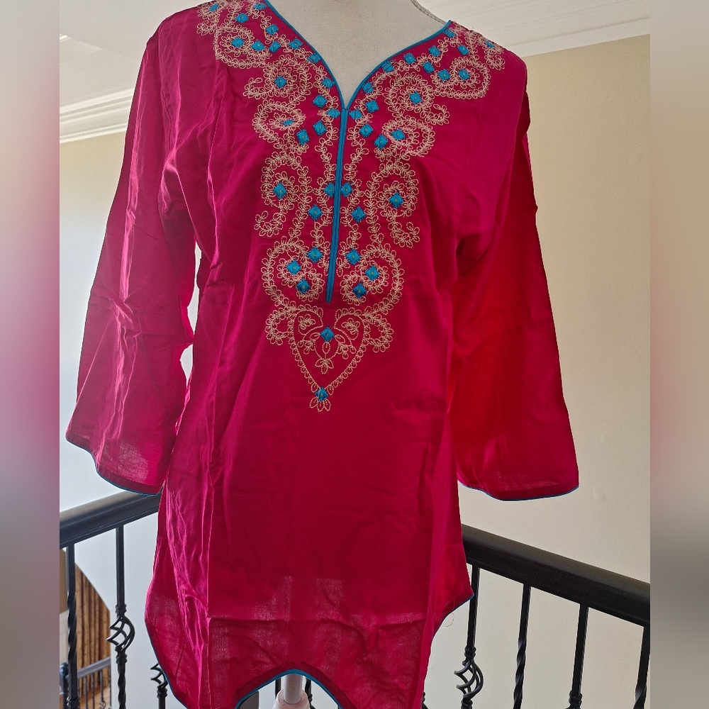 New, detailed embroidered  tunic with trimmed long sleeve and scalloped trim bot